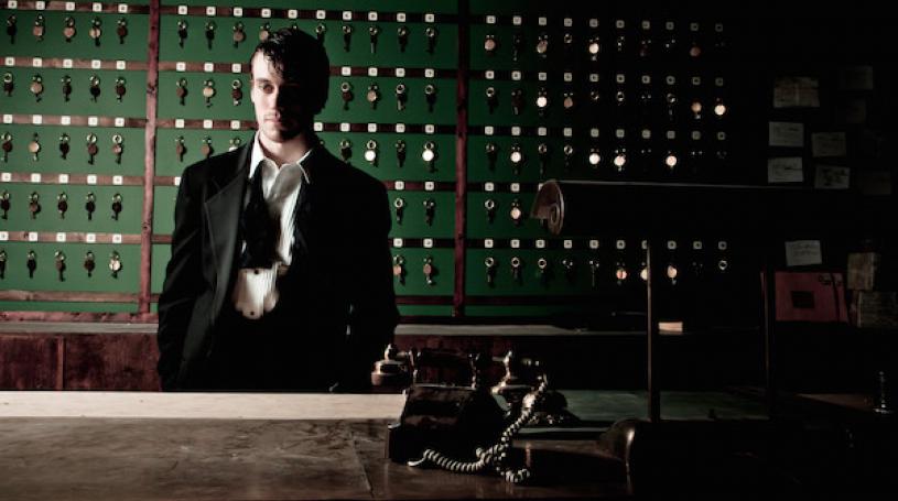 Guests of “Sleep No More” arrive at The McKittrick Hotel’s front desk, outfitted as a 1939 Manhattan hotel. Photo courtesy of McKittrick Hotel.